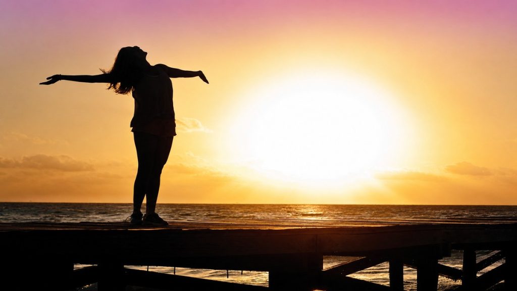 Woman celebrating in the sunshine