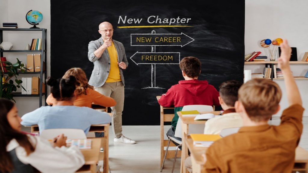 Teacher at blackboard